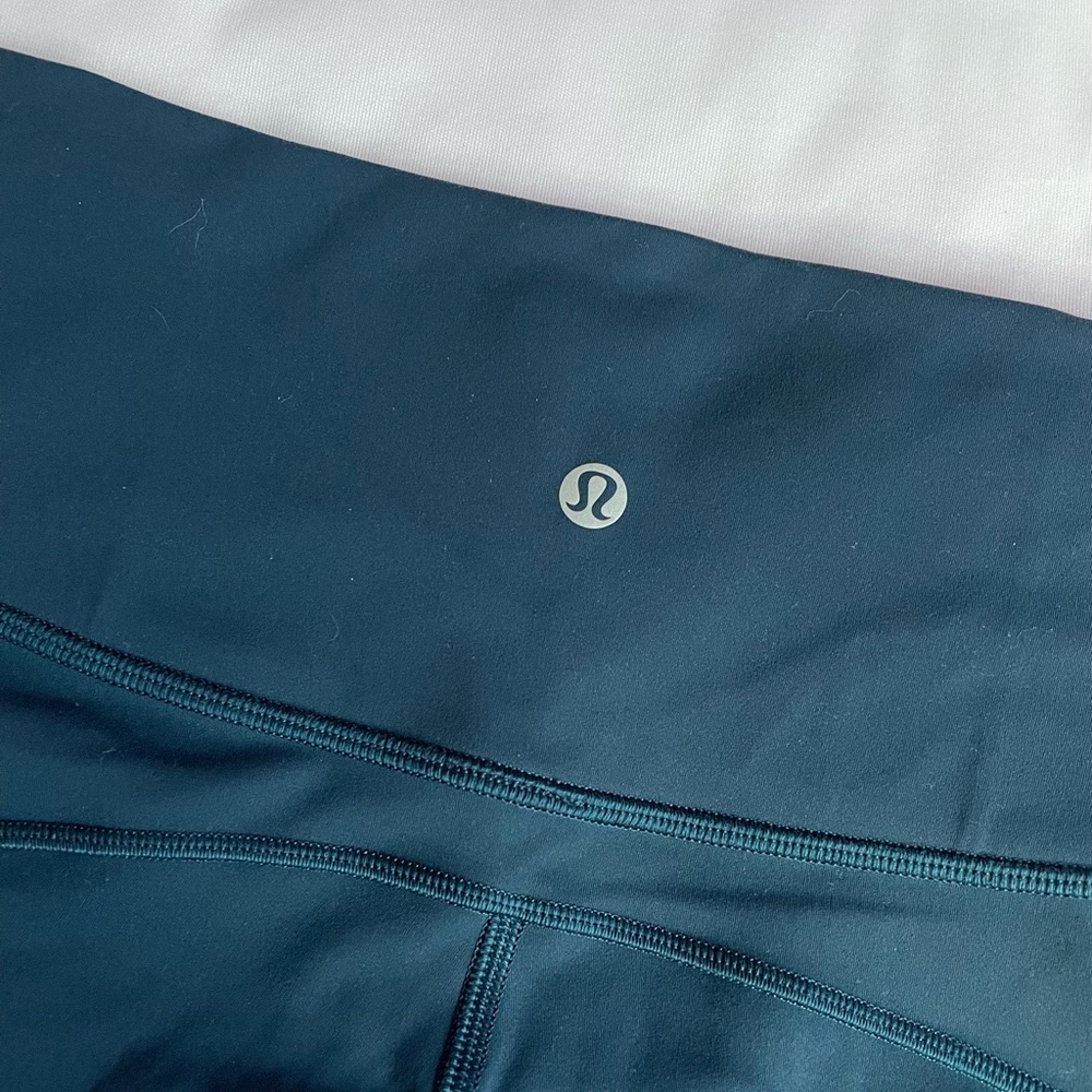 Lululemon In Movement Tight, Like New - Size 6, 25 inch Length, Night Diver